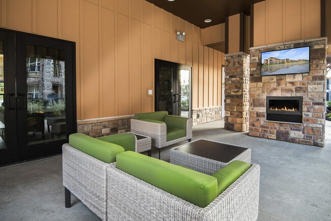Enjoy the warmth of our stone fireplace and modern seating.