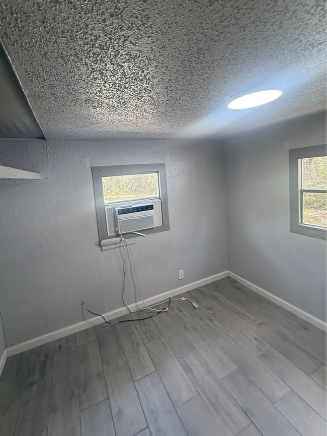 Photo - All utilities included. 2 Bedrooms. Lawn care included