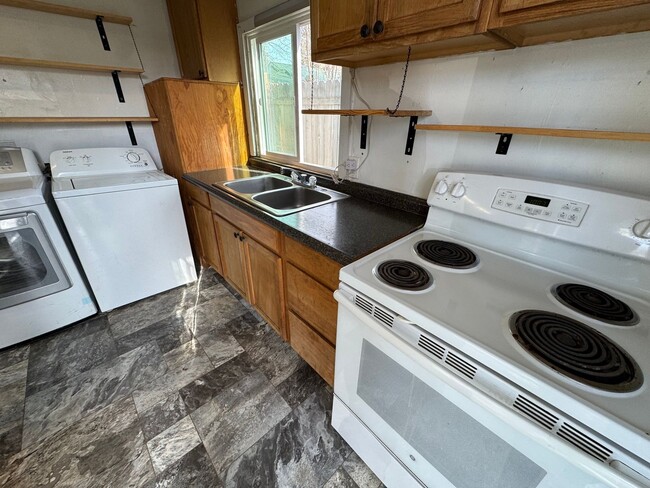 Building Photo - Private 2 Bed / 1 Bath Furnished Bungalow – Tucked Away & Move-In Ready – $1,300/Month