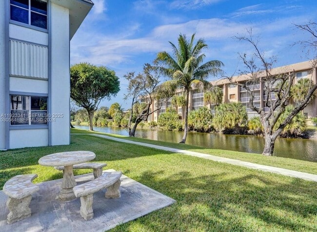 Building Photo - 6705 NW 169th St Unit C206