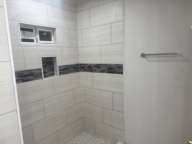 Walk in tiled shower