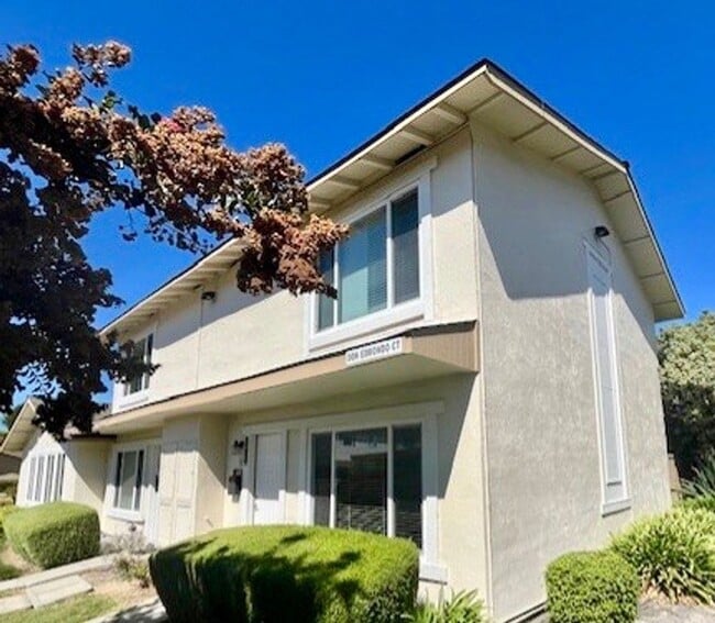 Building Photo - PETS OK!  2-story townhome with 2 bedrooms...