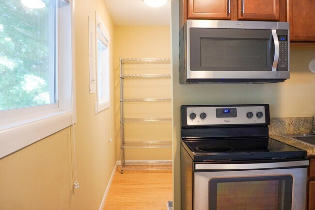 Photo - Top-Floor 2-Bedroom with Bamboo Flooring + Off-Street Parking! Unit 7532