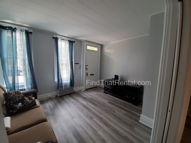 Photo - Charming Historic Retreat with Private Fenced Yard & Parking – Prime Downtown Location