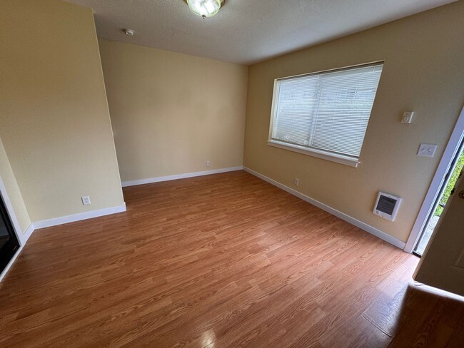 Photo - Blocks from UO! 2 large bedrooms 1.5 bath included in unit laundry and off street parking Unit #2
