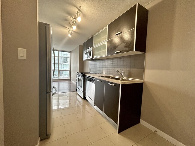 Photo - 9981 Whalley Blvd Unit 3401