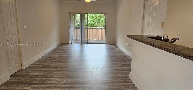 Building Photo - 5860 W Sample Rd Unit 201 Rental