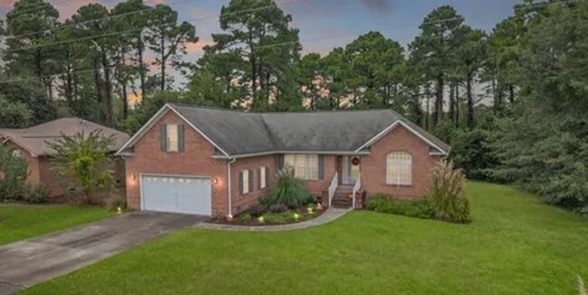 Building Photo - **Stately Brick Home in Fairfield Harbour | Tray Ceiling, Column, Bonus Room & Screened Porch**