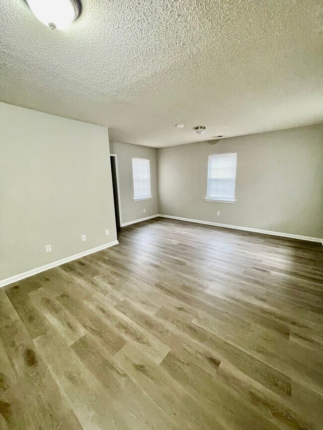 Photo - Welcome to this charming 3-bedroom, 2-bathroom home located in the vibrant city of Charlotte, NC.