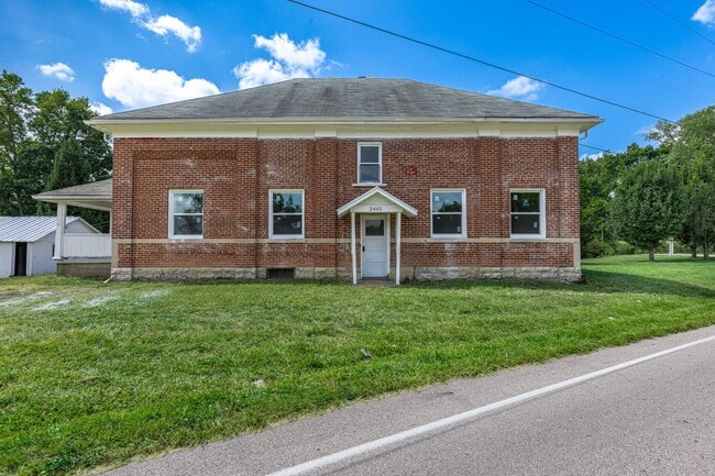 Photo - Welcome to this charming 3-bedroom, 1-bathroom brick house located in the vibrant city of Dayton,...