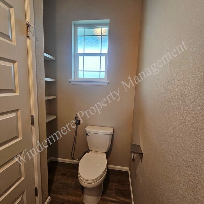 Photo - Spacious 4 Bedroom Home with Gas Fireplace, Office Space & 2-Car Garage!