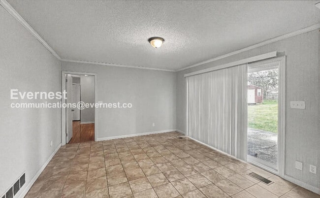 Photo - 2 Bed, 2 Bath Home with Garage / Pet-Friendly / Vouchers Accepted / Available Now!