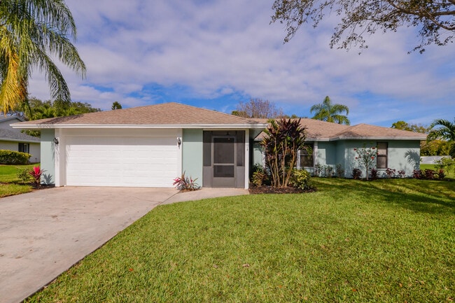 Photo - 2411 NE Pinecrest Lakes Blvd