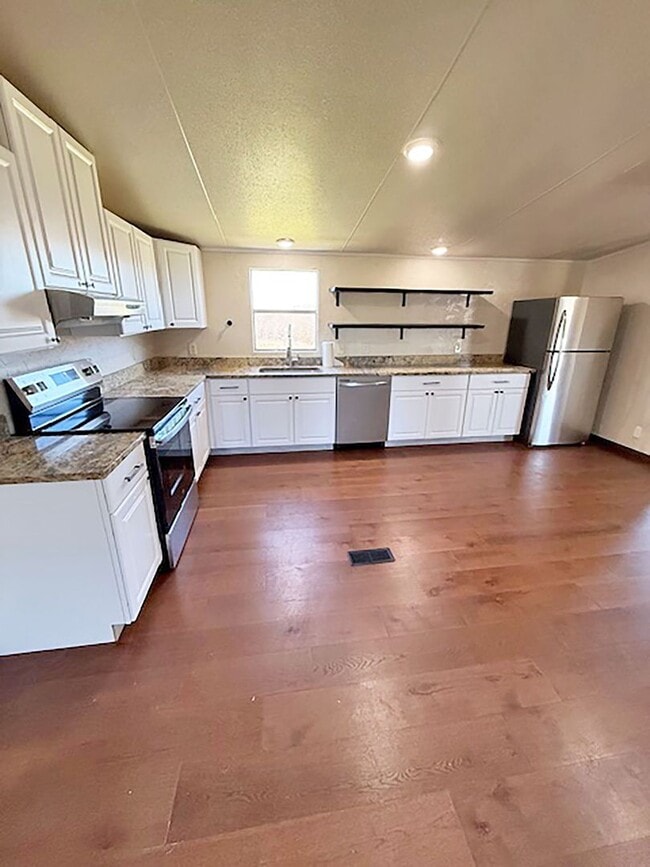 Photo - Beautiful 4 Bedroom 2 Bath manufactured home in Rhome Texas on 2 acres.