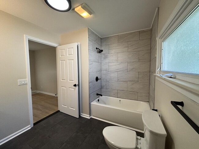 Photo - Charming Pet-Friendly Haven with Central AC & Spacious Living in Burton, MI
