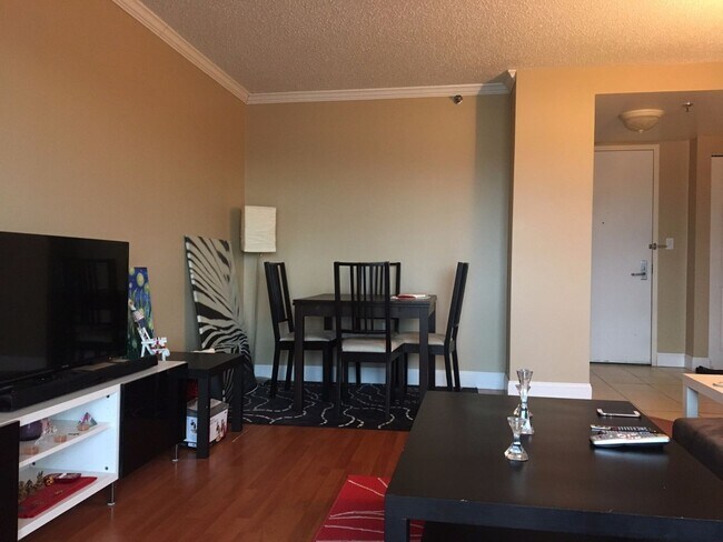 Photo - Spacious Top-Floor 2-Bedroom with Heat Included & Garage Parking!