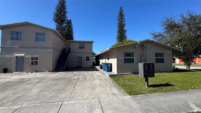 Building Photo - 2099 NW 26th Ave Unit 1-c