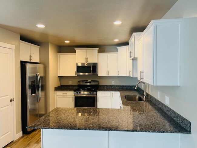 Photo - Beautiful home with central air and 2 car garage.