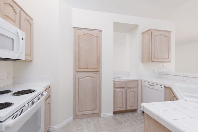 Photo - 3-bedroom 2-bathroom town house with a double car garage, freshly painted and new carpet.