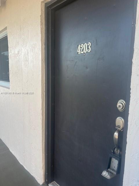 Photo - 9917 W Okeechobee Rd Condo Unit 203