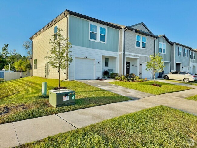 Building Photo - Upgraded 2023 3BR 3BTH Townhome  Near Apol...