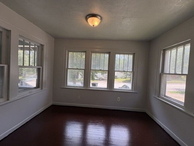 Photo - Spacious Akron Single-Family Home with Front Porch, Dining Room, Fireplace & Backyard!