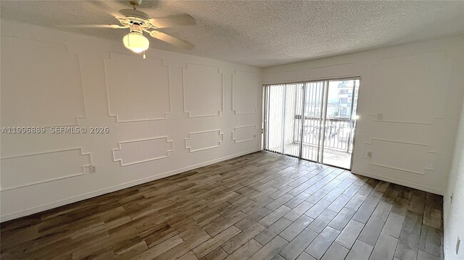 Photo - 711 N Pine Island Rd Unit 211