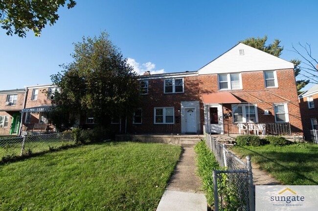 Building Photo - 1410 Dartmouth Ave Unit 2