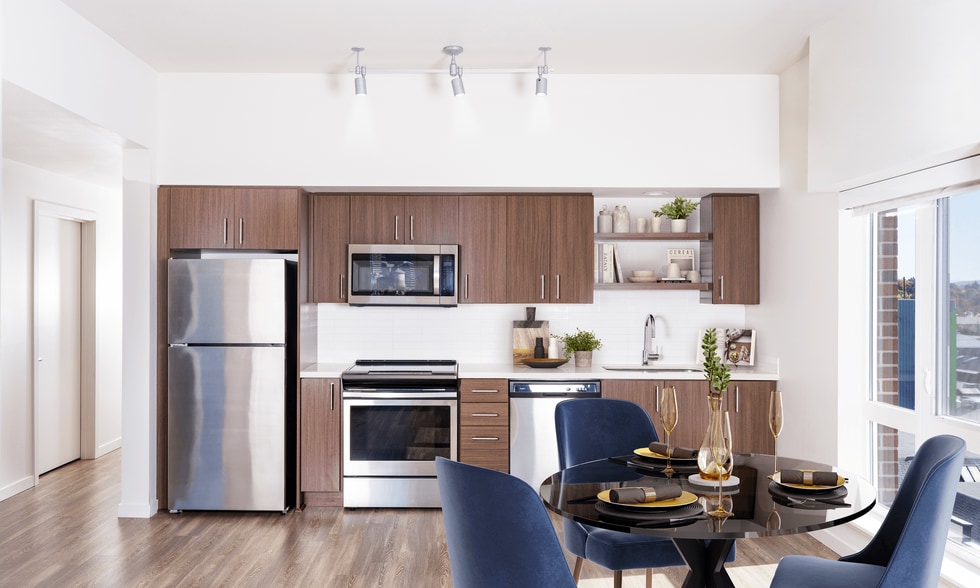 A bright, streamlined kitchen at Modera Belmont, offering modern finishes and an easy flow just steps from Belmont’s shops, dining, and neighborhood staples.