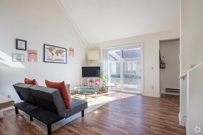 1BR, 2 BA - 840SF - Living Room - Lakepoint Commons