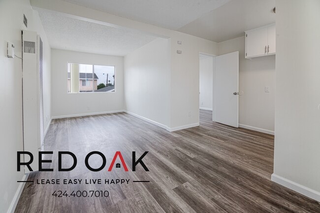 Building Photo - 10920 Ramona Blvd Unit O