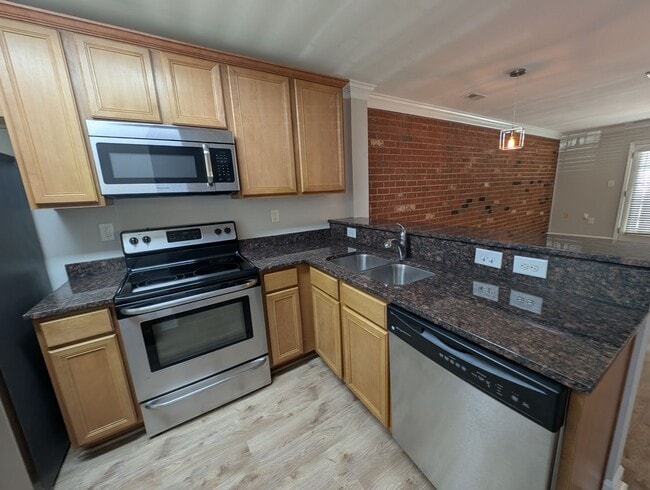 Photo - Cozy condo located in the Williamsburg on Commonwealth community minutes from Plaza Midwood! Unit F