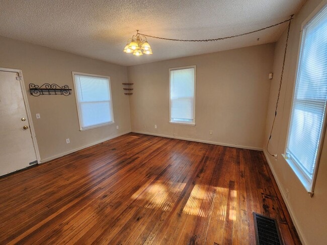 Photo - Nice home with oversized 2car gar with work bench and large shaded yard. Country-like setting