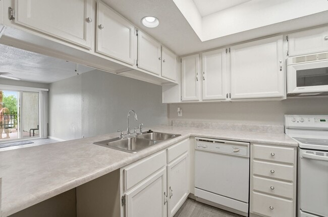 Photo - Central Phoenix Gem! Private Patio, Gated, Pool + Underground Parking Unit 105