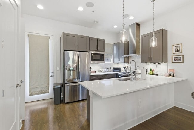 Photo - Modern Turnkey Townhome Steps from 12 South | 3BD/3.5BA | Garage, W/D & HOA Included — $3,695/Mo