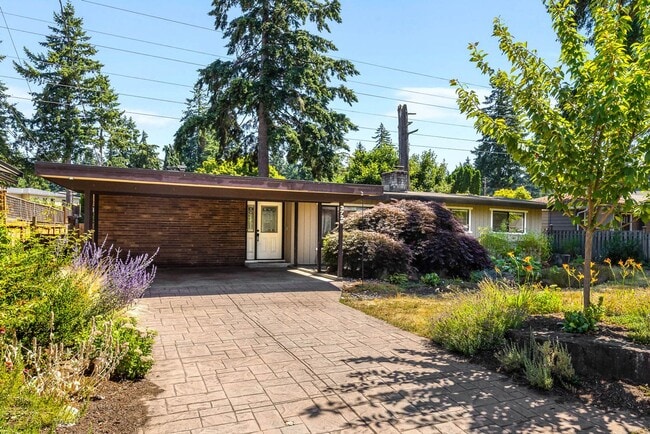 Building Photo - One-of-a-Kind Mid-Century Modern 4 Bedroom Retreat with Dream Backyard
