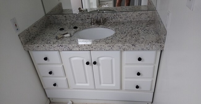Bathroom with granite countertops - 11257 S Cedar View Cir Unit A