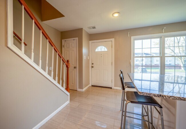 Photo - Spacious 3-Level Townhouse with Finished Basement and Fenced Patio