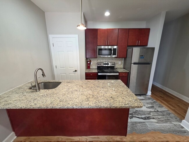 Building Photo - 655 N 63rd St Unit 1F Rental