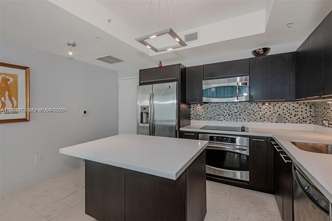 Photo - 90 SW 3rd St Unidad 2002