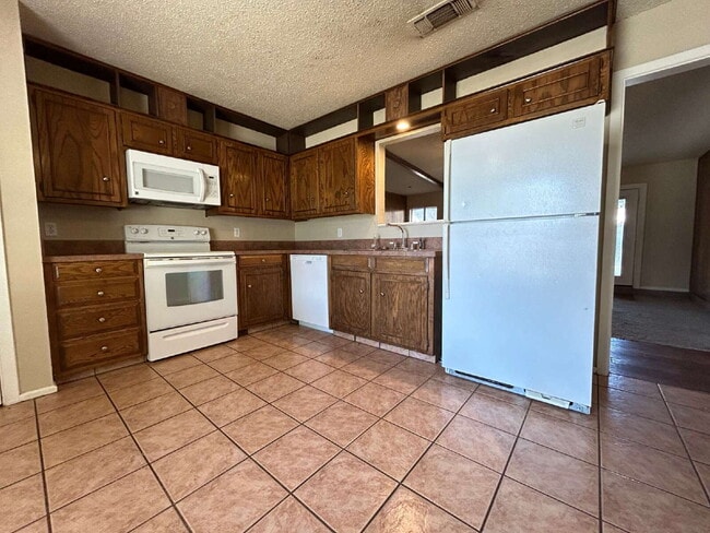 Photo - Welcome to this charming 3-bedroom, 2-bathroom home located in Lubbock, TX!