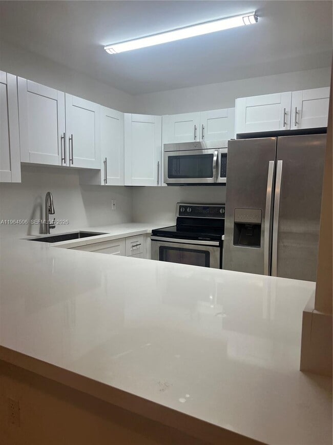 Building Photo - 13820 SW 112th St Unit 108