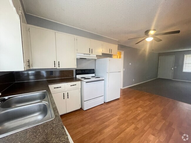 Building Photo - 5338 S Hutchinson Ct Unit B11 Rental