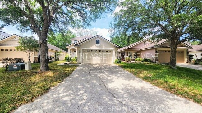 Building Photo - Spacious 4BR w/ Fenced Yard + Covered Lanai + 2 Car Garage in Orange Park!