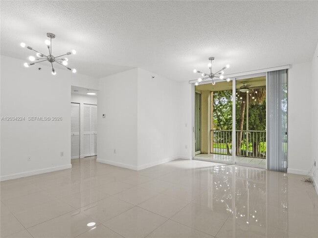 Building Photo - 9805 NW 52nd St Unit 207