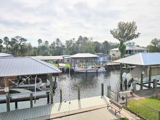 Building Photo - Waterfront 2 Bedroom, 2 Bath Stilt Home with Dock