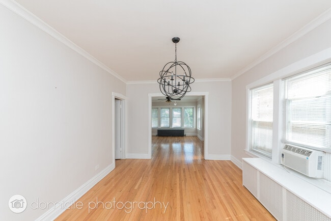 Building Photo - 4906 N Marmora Ave Unit 1