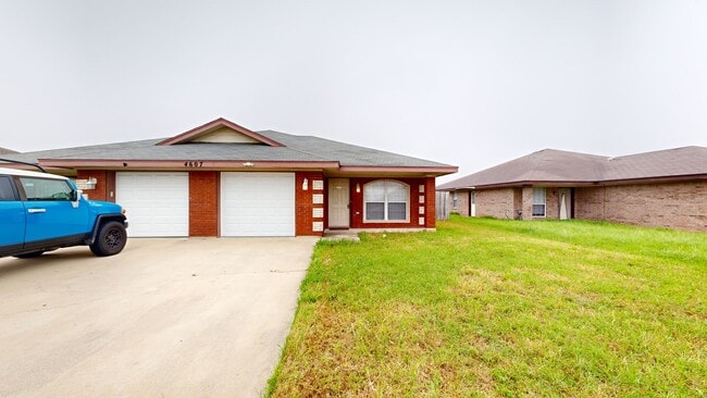 Building Photo - 2 WEEKS FREE + $1,295 ALL TILE DUPLEX BY FORT HOOD!!!