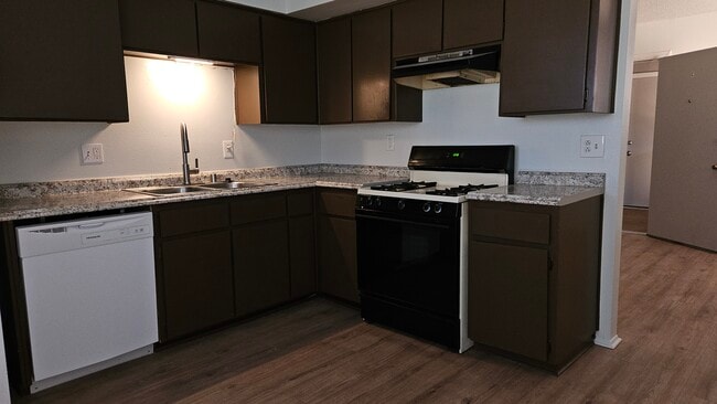 Kitchen, view toward living room. - 544 Chama St SE Unit C