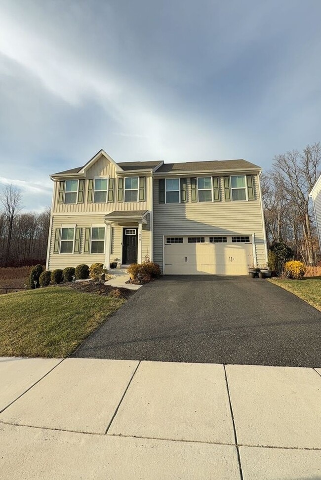 Building Photo - Stunning & Spacious Middle River 4bd/2.5ba Home with W/D, AC, Garage and more! Available now